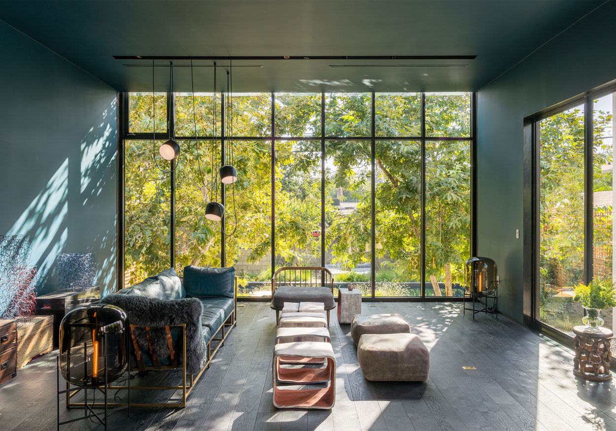 Interior view of our Modern Bungalow residence, overlooking a lush backyard