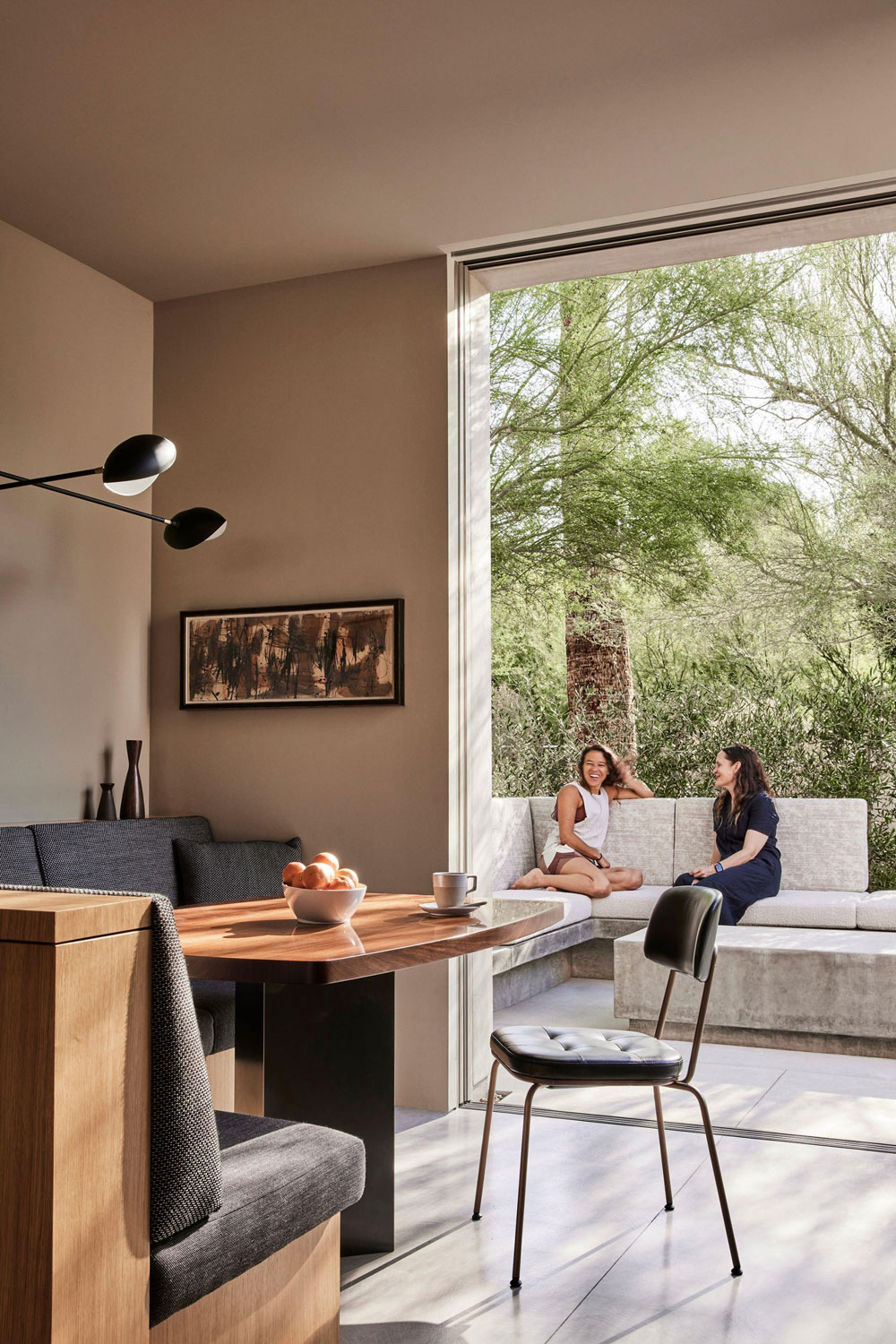 View of dining nook and outdoor gathering area at Slot Canyon residence